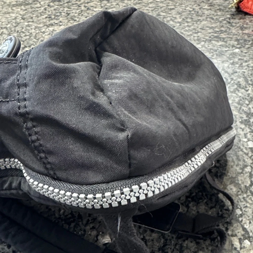 Kipling Hal Expandable Black Backpack with large Silver Accent zippers EUC